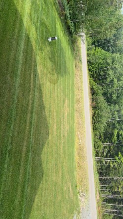 Fresh stripes after mowing completed by JT Landscaping